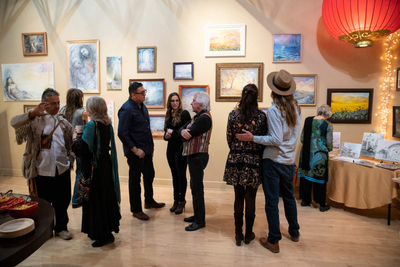 People looking at the gallery in the cosmo art studio